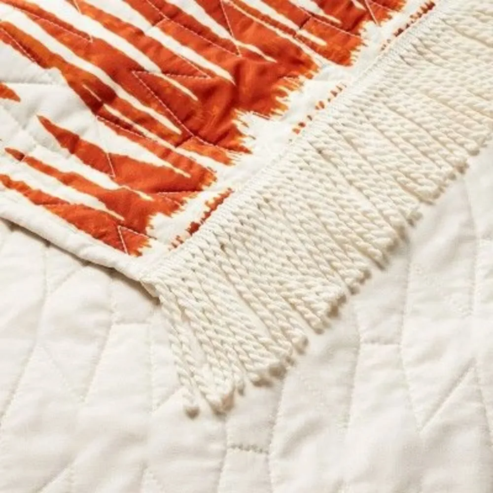 Rust Ikat Quilted Throw Blanket - Cream and Rust